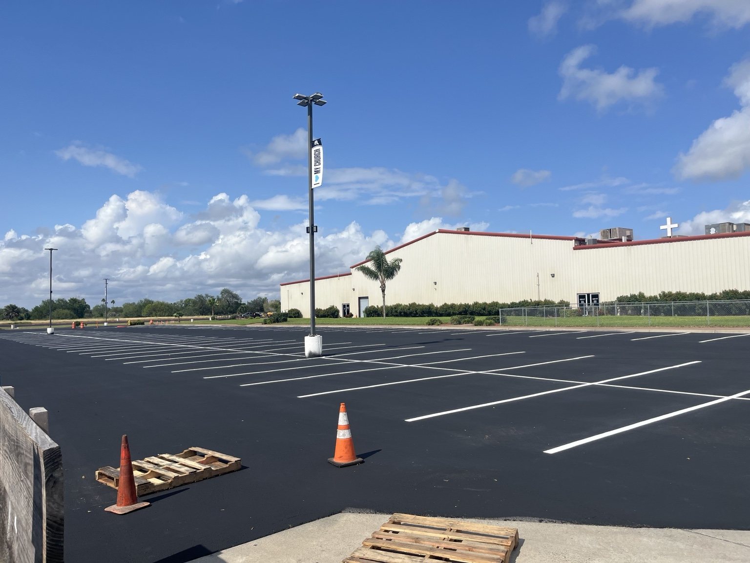 Large commercial parking lot with white striping