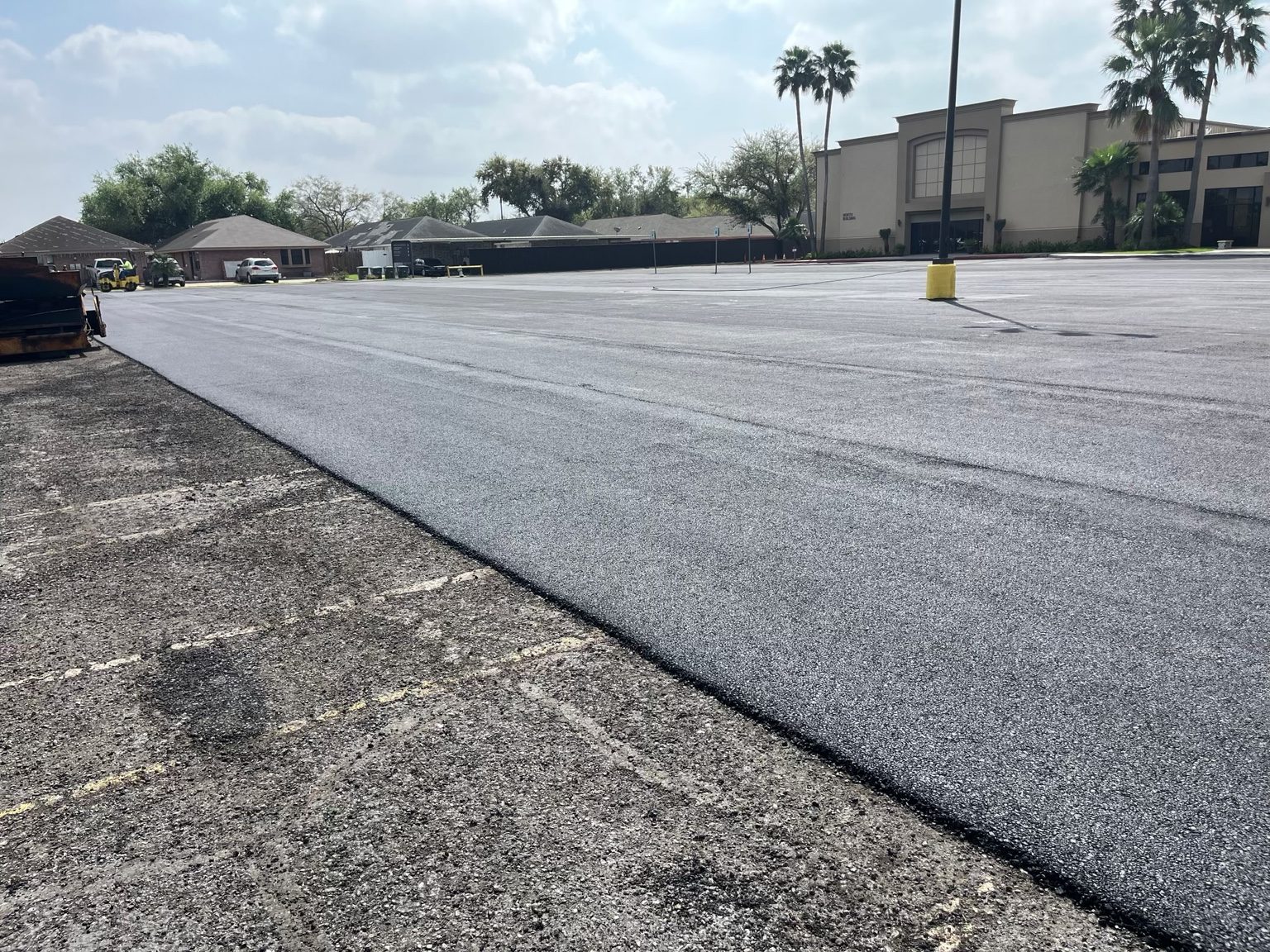 Fresh asphalt surface at a commercial property