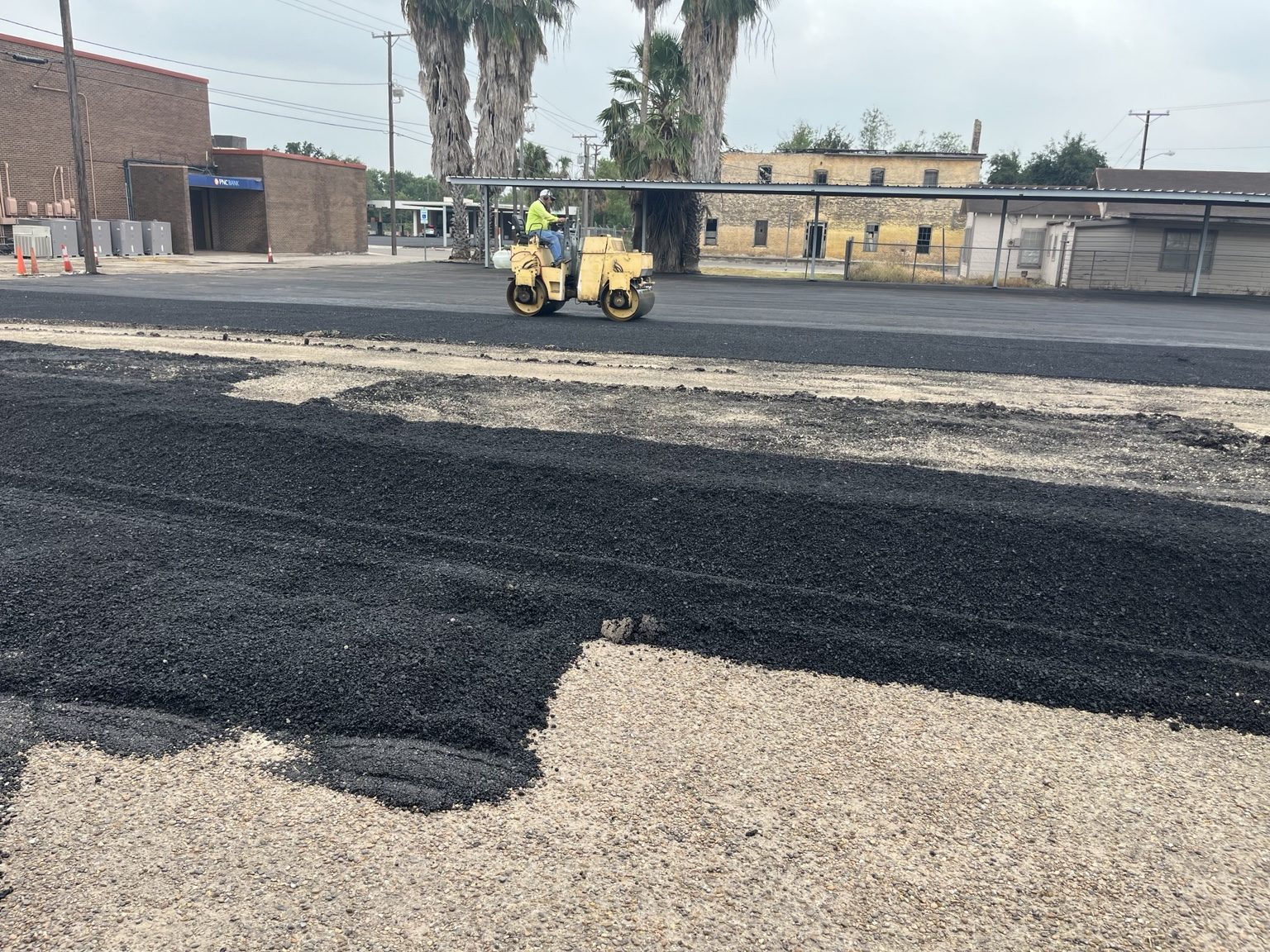 Asphalt paving work in progress with roller