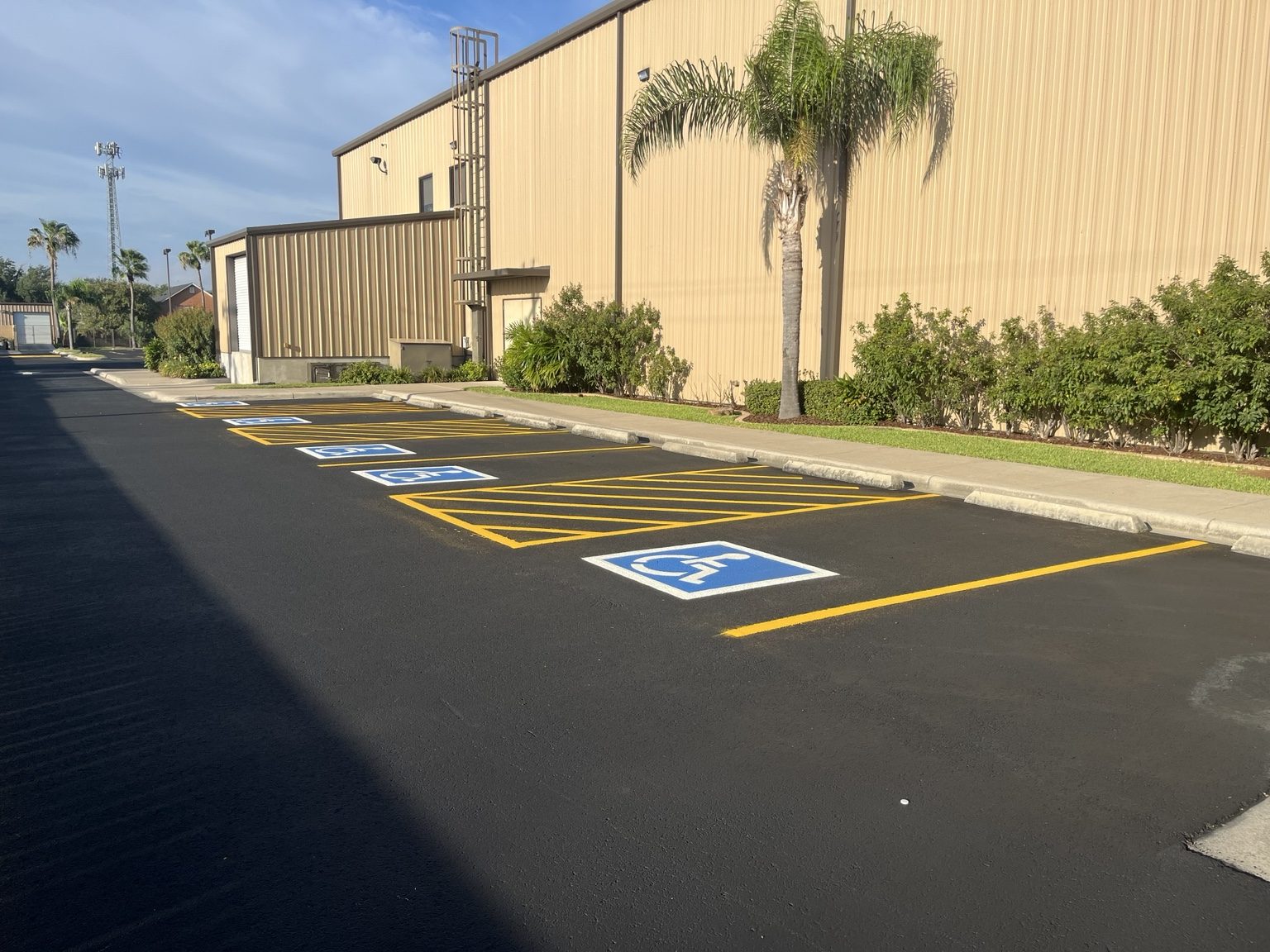 Accessible parking and yellow access aisle striping